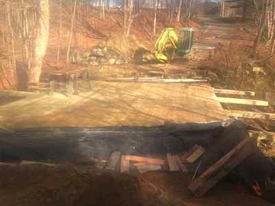 Owl Brook Bridge - old timber deck removal with excavator on site