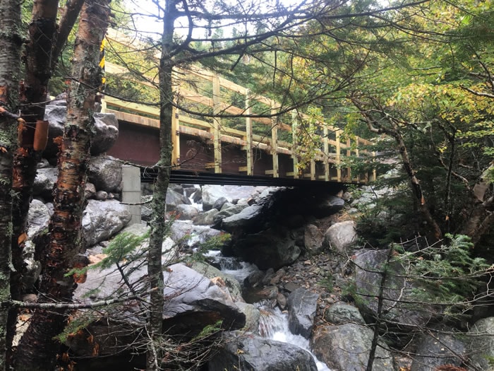 Tuckermans Trails - new timber bridge over rocky stream in forest