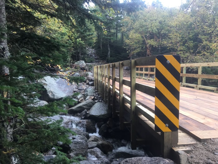 Tuckermans Trails - side view of new timber bridge over rocky stream