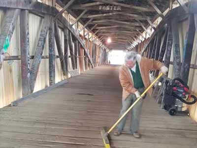 Beechfork covered bridge interior during cleaning and restoration work