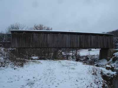 Johnson Creek covered bridge exterior in winter overcast light after restoration