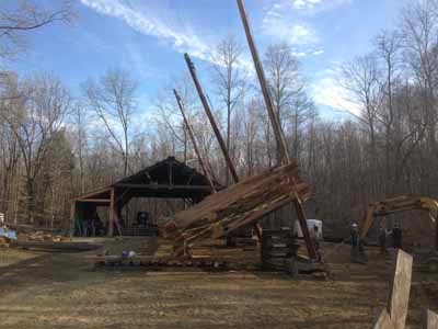 Perry barn historic structure with fallen timber and stone foundation